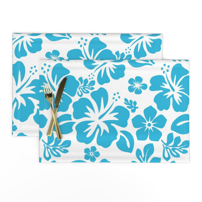 Two blue hawaiian floral placemats